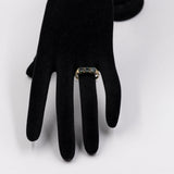 Anello vintage trilogy in oro giallo 8k con spinelli verdi