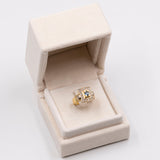 ANELLO VINTAGE IN ORO GIALLO 18K CON TOPAZIO (0.40CT CA.) E DIAMANTI DI TAGLIO BRILLANTE (0.20CTW CA.), ANNI ‘60/‘70