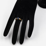 Trilogy vintage in oro giallo 9K con topazio blu e diamanti