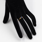 Trilogy vintage in oro giallo 9K con topazio blu e diamanti