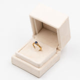 Trilogy vintage in oro giallo 9K con topazio blu e diamanti