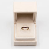 Anello vintage a veretta in oro giallo 8k con granati