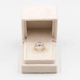Anello vintage in oro giallo e bianco 18k con diamante centrale (1ct) e diamanti laterali (0,50ct)