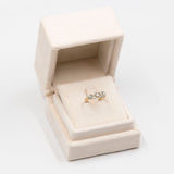 Anello vintage in oro giallo 9k con tormaline azzurre e diamanti