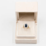 Anello vintage a margherita in oro giallo e bianco 14k con zaffiro (1,50ct) e diamanti (0,70ctw), anni '70