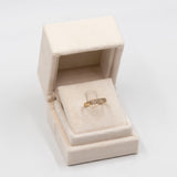 Anello vintage in oro giallo 9k con topazi bianchi
