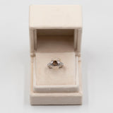 Anello vintage in platino 900 con diamante centrale brown di 1,01ct e contorno di diamanti bianchi (0,32ctw)
