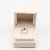 Anello antico a fascia in oro rosa 8K con pasta di vetro rossa e perline, primi del ‘900