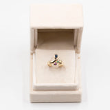 Anello vintage in oro giallo 14k con zaffiro, rubino, smeraldo e diamante. Anni '70