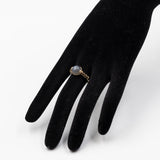 Anello in oro giallo 9k con calcedonio e quarzi fumé