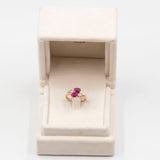 Anello "bypass" vintage in oro giallo 9K con rubini (1ctw ca.) e diamanti