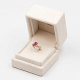 Anello "bypass" vintage in oro giallo 9K con rubini (1ctw ca.) e diamanti