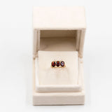 Anello vintage trilogy in oro giallo 14k con granati