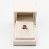 Anello vintage in oro giallo 18k con rubino e rosette di diamante, anni '50