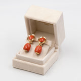 Orecchini in oro giallo 18k e corallo rosso , anni '50