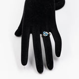 Anello vintage bypass in oro giallo 9K con topazi azzurri (0.90ctw ca.) e diamanti