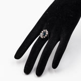 Anello vintage a margherita in oro bianco 14k con zaffiro marquise (1ct) e diamanti (0,60ctw), anni '70