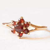 Anello a margherita vintage in oro giallo 9K con granati, anno 1979