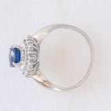 Anello a margherita vintage in platino con zaffiro (1.01ct) e diamanti (0.30ctw), anni ‘80/‘90