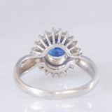 Anello a margherita vintage in platino con zaffiro (1.01ct) e diamanti (0.30ctw), anni ‘80/‘90