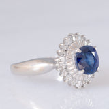 Anello a margherita vintage in platino con zaffiro (1.01ct) e diamanti (0.30ctw), anni ‘80/‘90