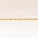 Braccialetto semirigido in oro giallo 14K con smeraldi (0.50ctw ca.) e diamanti (0.02ctw ca.), anni ‘70/‘80