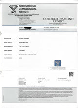 Anello moderno in oro bianco 18k con diamante centrale fancy rosa (0.32ct) e contorno di diamanti (0.18ctw)