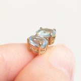 Orecchini punto luce vintage in oro giallo 9K con topazi azzurri, anni ‘90