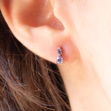 Orecchini punto luce in oro bianco 9K con tanzaniti (0.22ctw ca.) e diamanti, anni ‘80