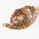 Braccialetto semirigido vintage in oro giallo 8K con granati, anni ‘60/‘70