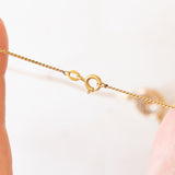 Collier con catenina in oro giallo 18K e con decorazione centrale convertita da orecchino antico in oro giallo 18K con diamanti di taglio rosetta (primi del ‘900)