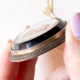 Pendente antico in oro giallo 14K e argento con micromosaico su onice rappresentante il Pantheon e con diamante di taglio rosetta (0.50ct ca.), seconda metà dell’800