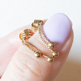 Orecchini vintage pendenti in oro giallo 9K, anni ‘60