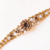 Braccialetto semirigido vintage in oro giallo 8K con granati, anni ‘60/‘70