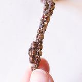 Braccialetto semirigido vintage in oro giallo 8K con granati, anni ‘60/‘70