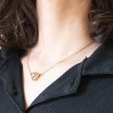 Collier con catenina in oro giallo 18K e con decorazione centrale convertita da orecchino antico in oro giallo 18K con diamanti di taglio rosetta (primi del ‘900)