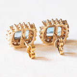 Orecchini a margherita vintage in oro giallo 14K con topazi azzurri (4.80ctw ca.) e diamanti di taglio brillante (0.72ctw ca.), anni ‘70/‘80