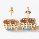 Orecchini a margherita vintage in oro giallo 14K con topazi azzurri (4.80ctw ca.) e diamanti di taglio brillante (0.72ctw ca.), anni ‘70/‘80