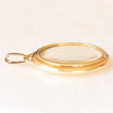 Ciondolo portafoto antico placcato in oro giallo con diamanti di taglio rosetta e con scomparto in vetro sul retro, primi del ‘900