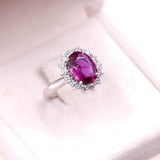 Anello a margherita in oro bianco 18k con rubino naturale (2,85ct) e diamanti (0,72ctw)