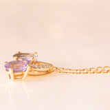 Collana vintage con catenina in oro giallo 9K e ciondolo in oro giallo 10K con tanzaniti (1.30ctw ca.) e diamanti