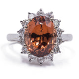 Anello vintage in oro 18K con granato arancione (6.60ct ca.) e diamanti (0.70ctw ca.), anni '60