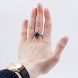Vintage 18K gold ring with central cabochon sapphire and diamonds, 1960s