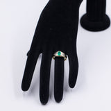 Anello vintage in oro giallo 18K con smeraldo (0.50ct ca.) e diamanti (0.12ctw ca.), anni '70