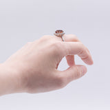 Anello vintage in oro 18K con granato arancione (6.60ct ca.) e diamanti (0.70ctw ca.), anni '60