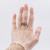 Vintage two-tone 18k gold ring with central diamond (0.15 ct), 1940s