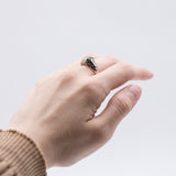 Vintage two-tone 18k gold ring with central diamond (0.15 ct), 1940s