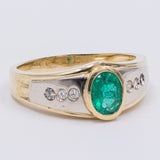 Anello vintage in oro giallo 18K con smeraldo (0.50ct ca.) e diamanti (0.12ctw ca.), anni '70