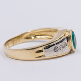 Anello vintage in oro giallo 18K con smeraldo (0.50ct ca.) e diamanti (0.12ctw ca.), anni '70