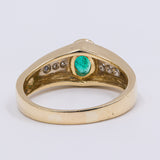 Anello vintage in oro giallo 18K con smeraldo (0.50ct ca.) e diamanti (0.12ctw ca.), anni '70